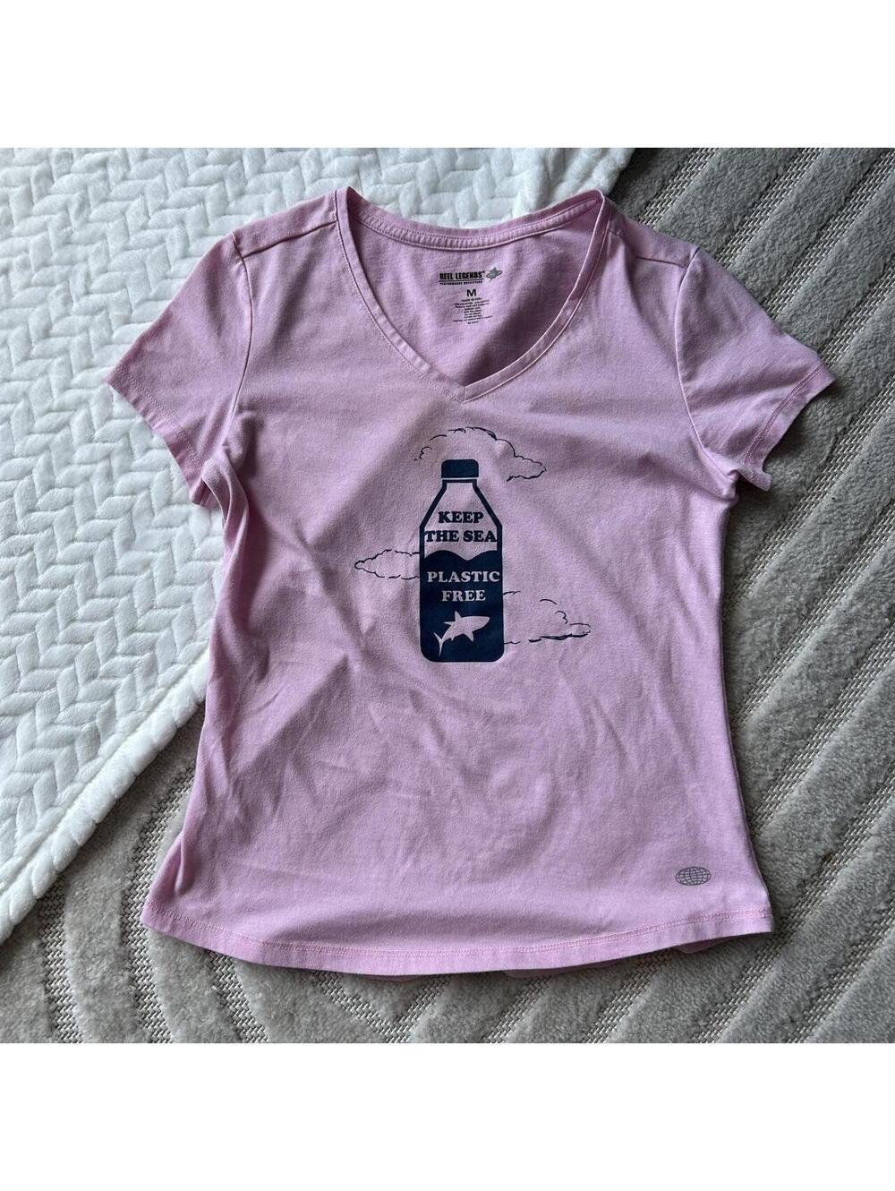 Pink Keep the Sea Plastic Free baby tee with blue graphic of a bottle